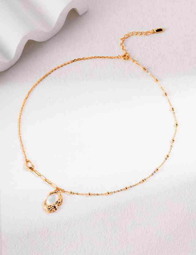 Gold seashell necklace from Celestial Seashell Collection