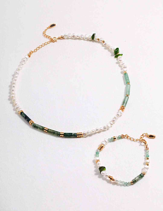 a pair of necklace and bracelet with pearls and green dongling jade and aquatic agate