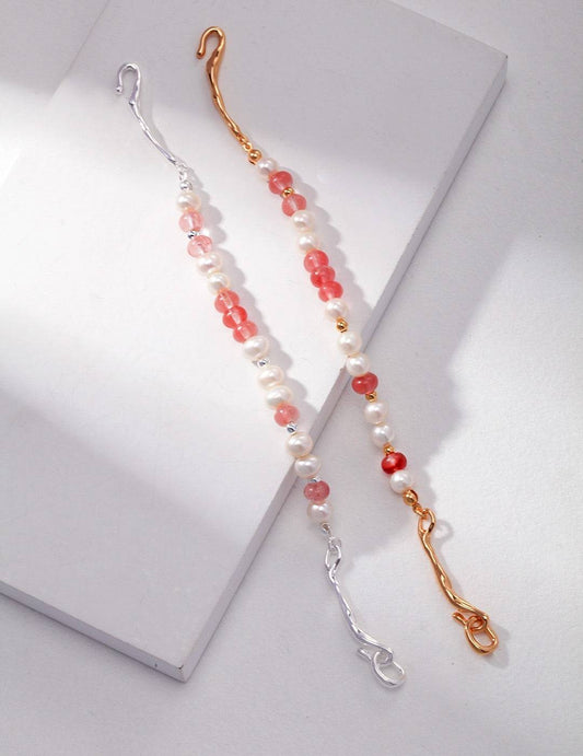 a pair of red and white beaded necklaces