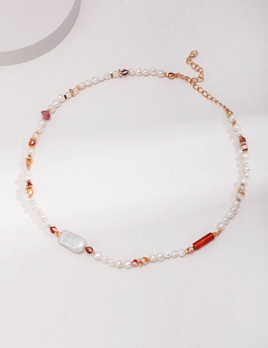 a strawberry quartz and pearl necklace