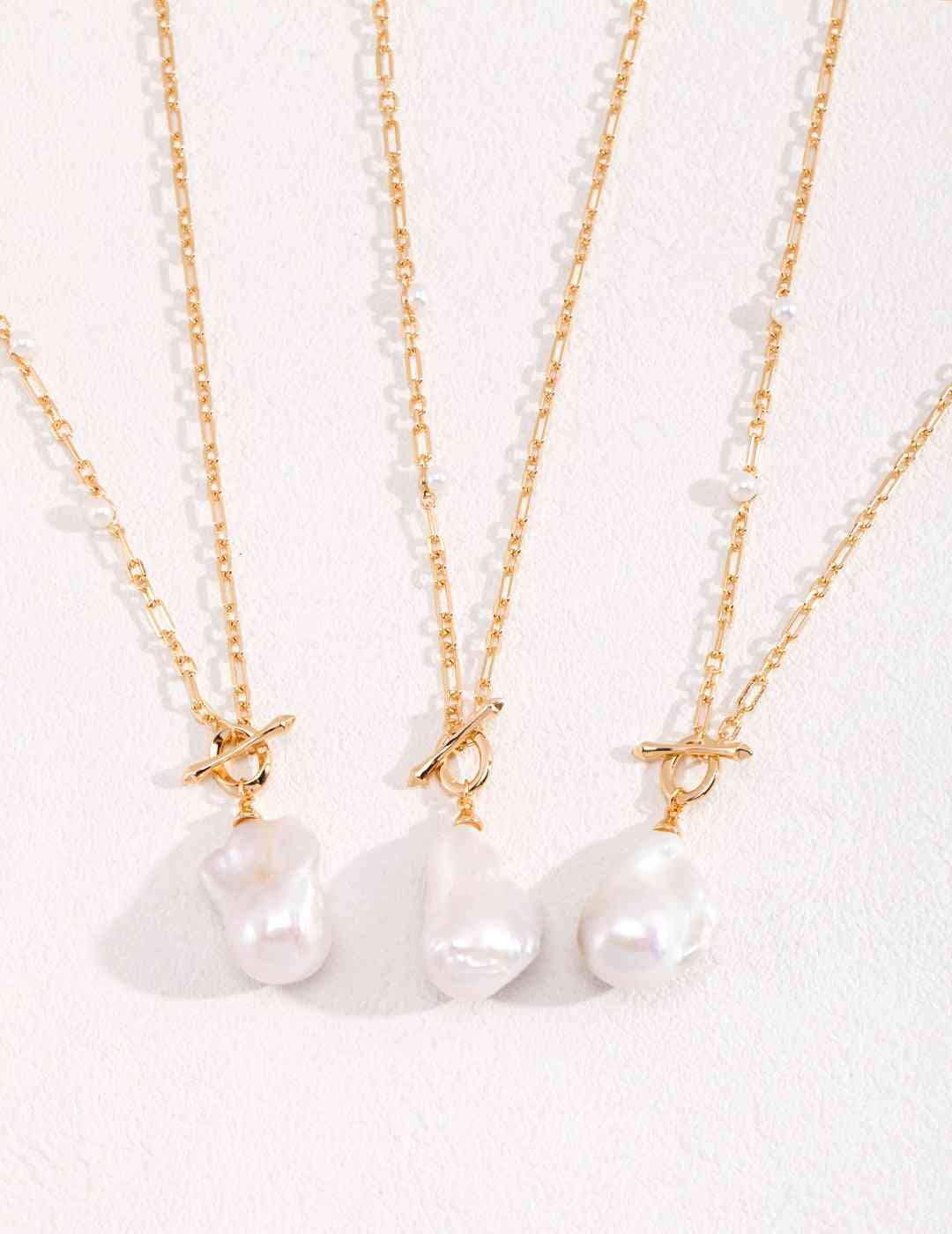 Baroque pearl necklaces with gold-tone chains